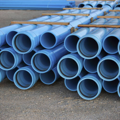 The rows of construction pipes on the ground
